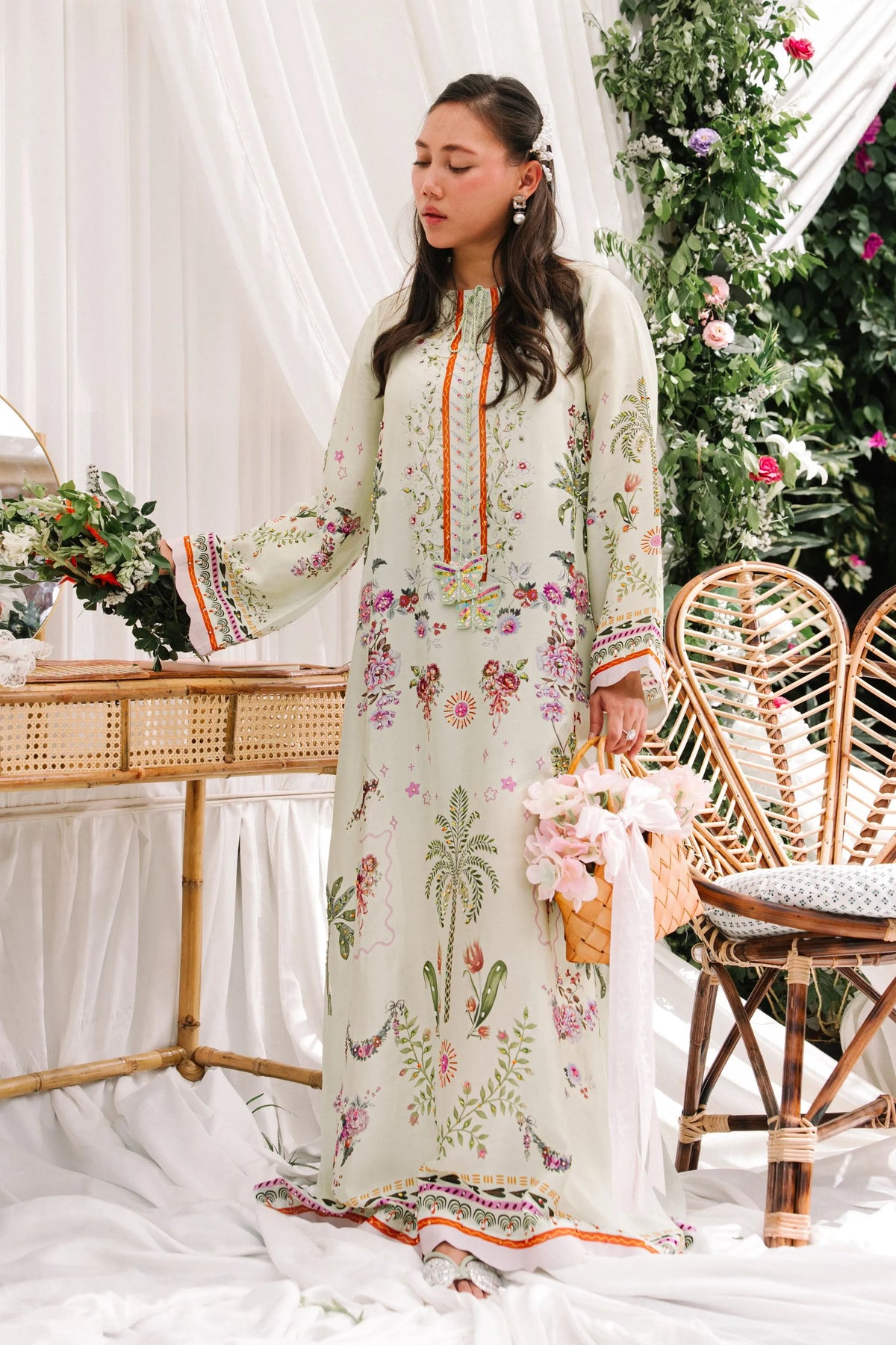 Camelia ivory sheesha silk shirt with floral print, tasseled tie neckline and orange placket